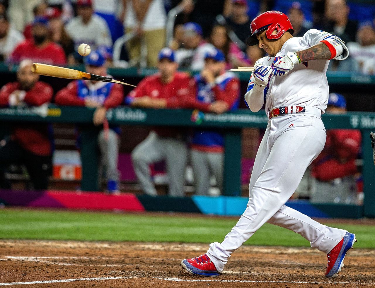 Third baseman Manny Machado of the Dominican Republic breaks his bat during a World Baseball Classic game against Puerto Rico in Miami on Wednesday, March 15.